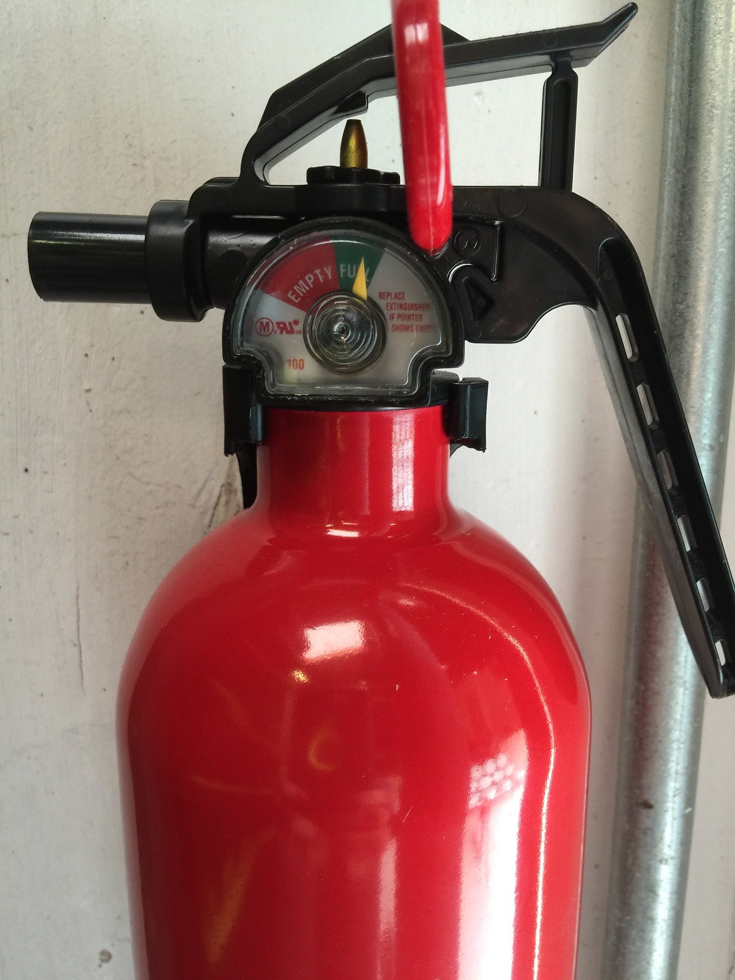 Close-up of a red fire extinguisher